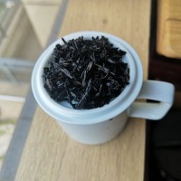 郁江牌金花六堡茶 黑褐油潤陳香純正黑茶 味陳醇厚湯色深紅明亮